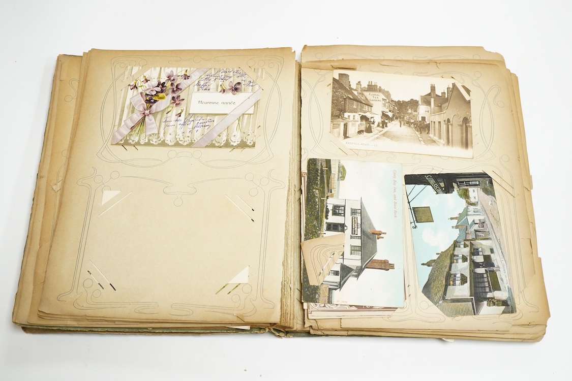 An album of Edwardian and later postcards and a small WWI La Guerre Europeenne booklet of postcards